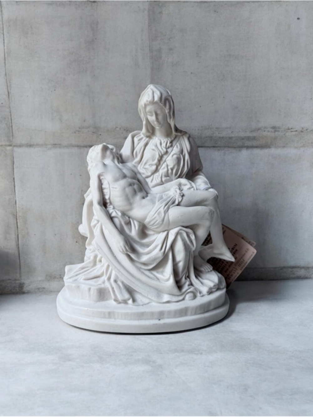Michelangelo's Pietà statue, crafted from a marble by Santini made in Italy